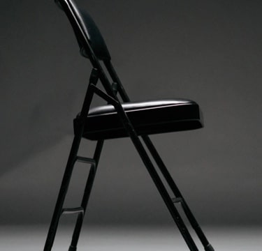 A beautiful black metal chair